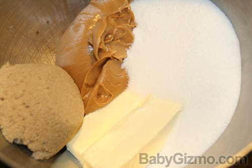 butter, peanut butter and sugars in a bowl