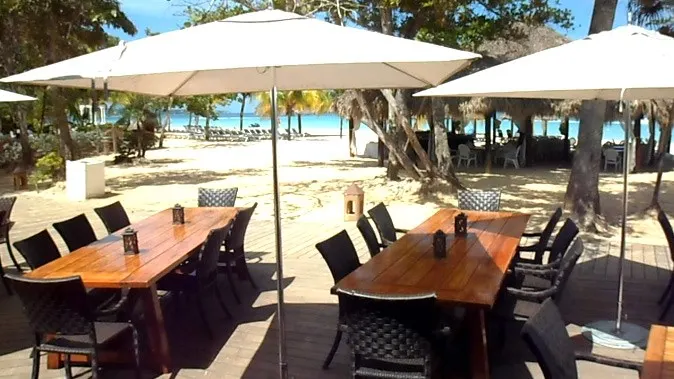 outdoor tables on a beach