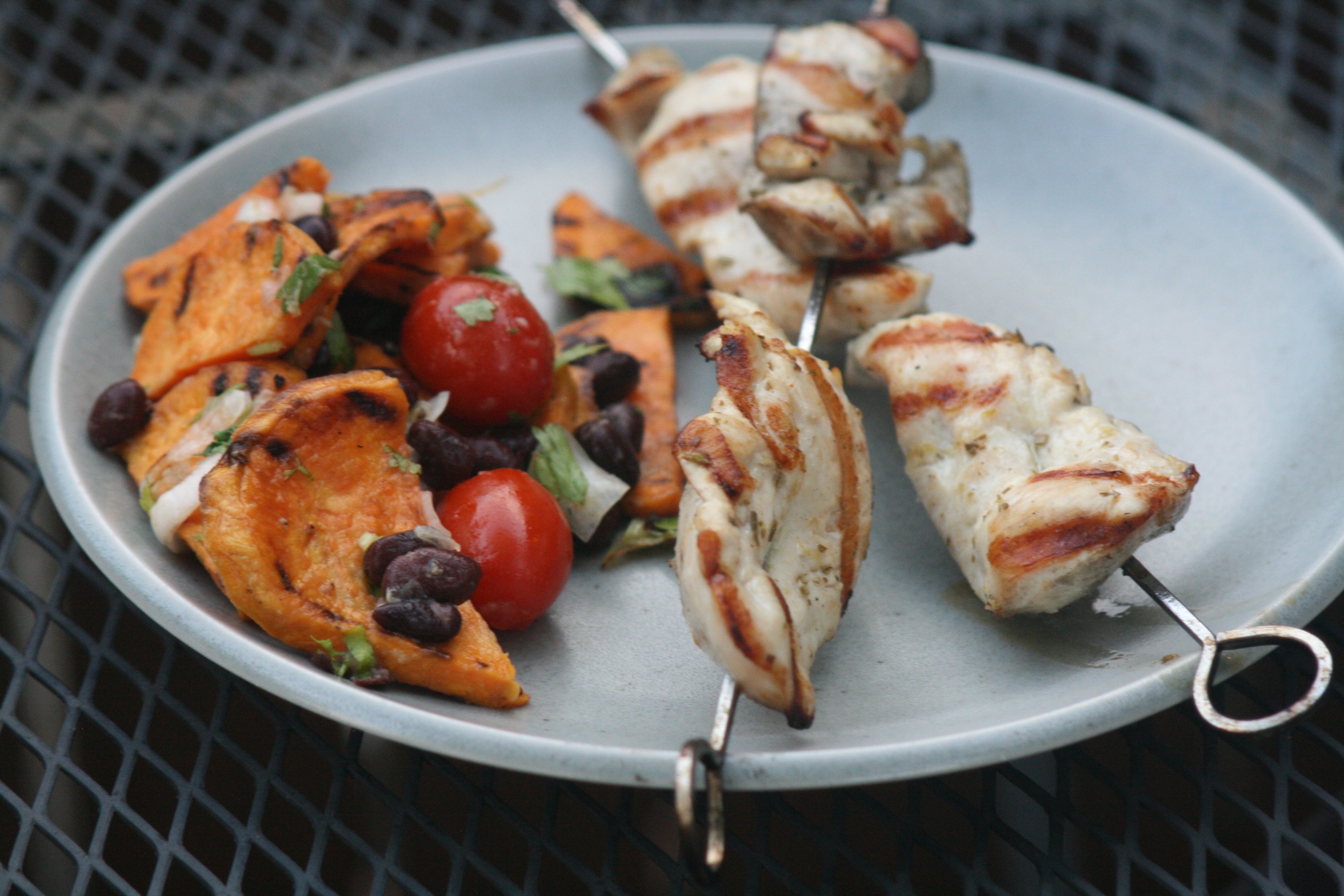 Grilled sweet potato salad and chicken skewers