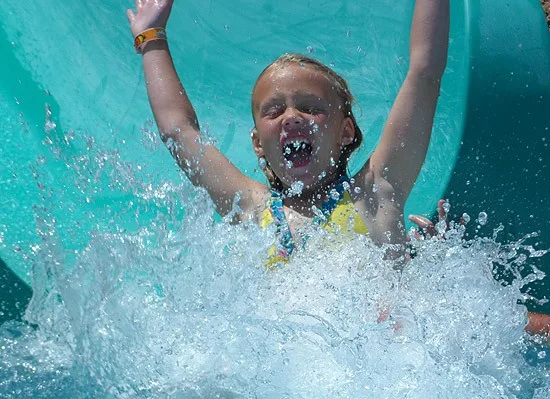 little girl on water slide