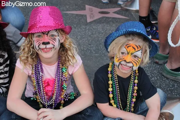two kids with tiger faces