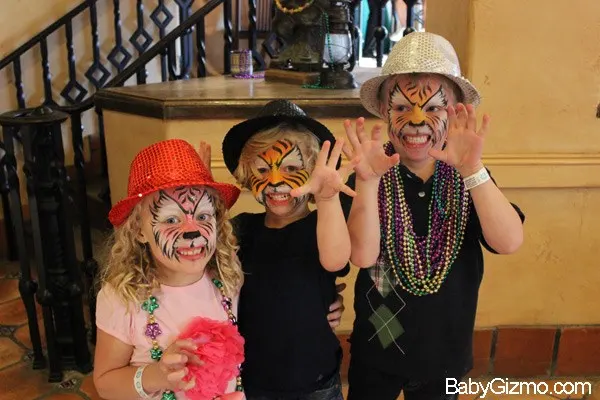 three kids with tiger faces