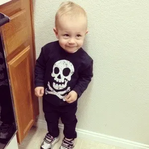 toddler with skull and bones tshirt