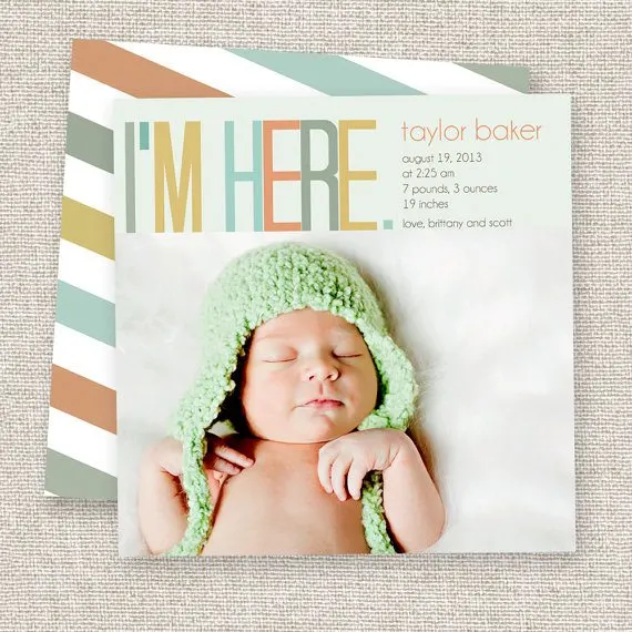 baby with green hat birth announcement