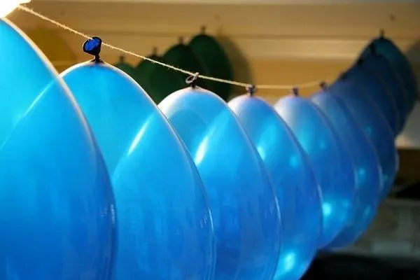 blue balloon in a row