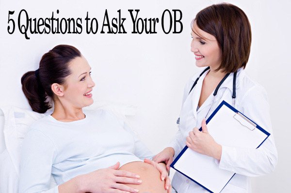 pregnant lady talking to doctor