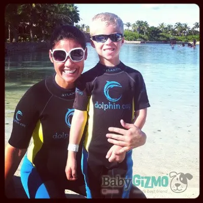 Dolphin with mom and sun