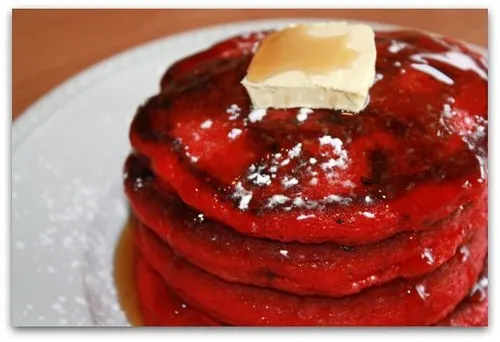 red velvet pancakes in a stack