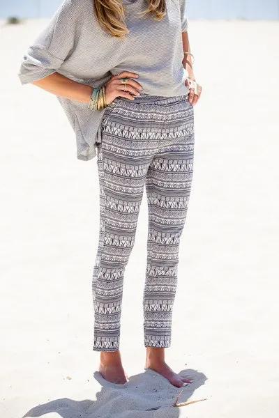 grey top and patterned leggings