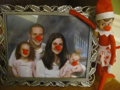 elf on the shelf puts red noses on family