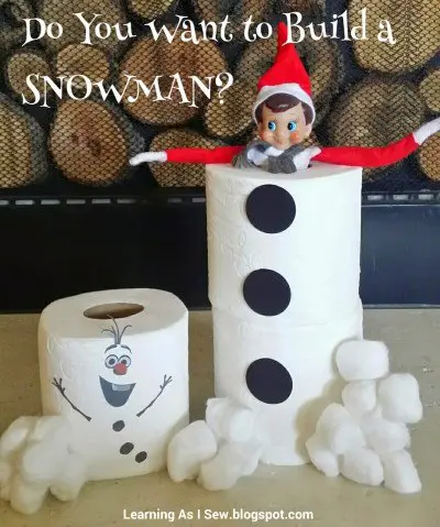elf ON THE SHELF in toilet paper rolls