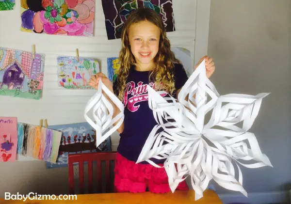 girl holding 3d snowflake