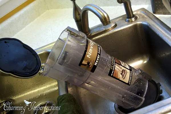 vacuum canister in sink