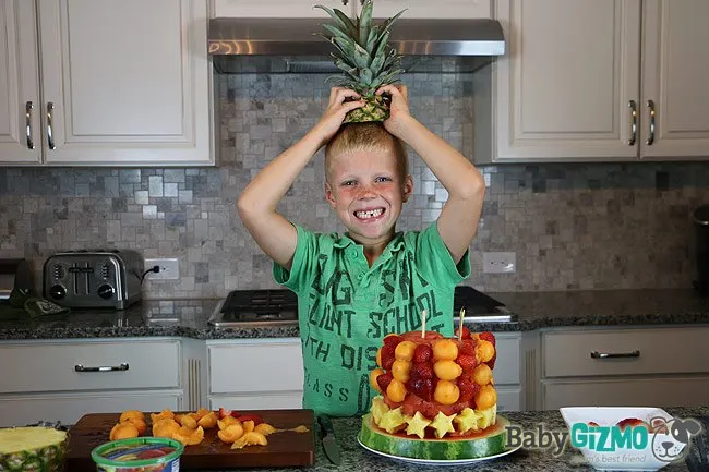 boy with pineapple on head