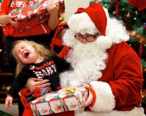 little girl screaming with santa
