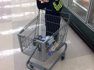 boy with grocery cart