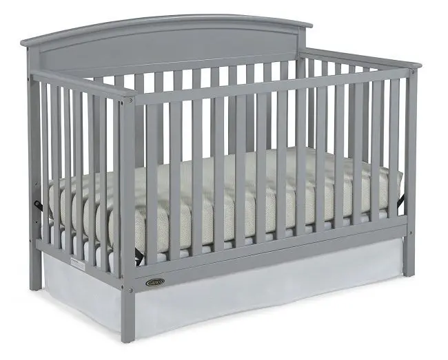 babyletto grey crib on white background