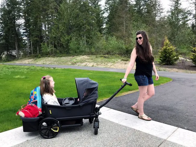 mom pulling the veer wagon with toddler