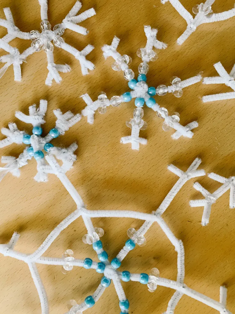 Beaded Pipe Cleaner Snowflakes - One Little Project