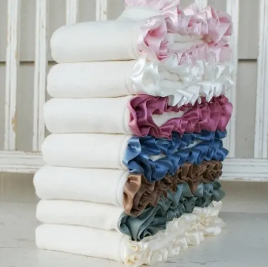 stack of organic baby blankets