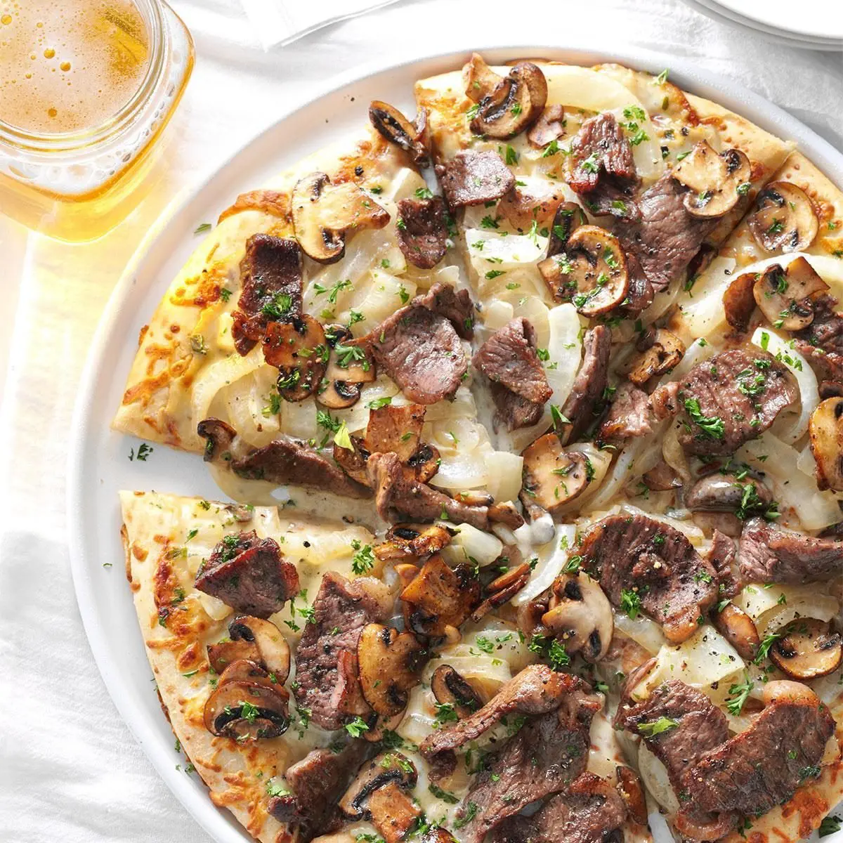 steak and blue cheese pizza cut into 6 pieces