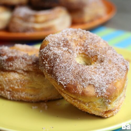 Air fryer donuts on yellow plate