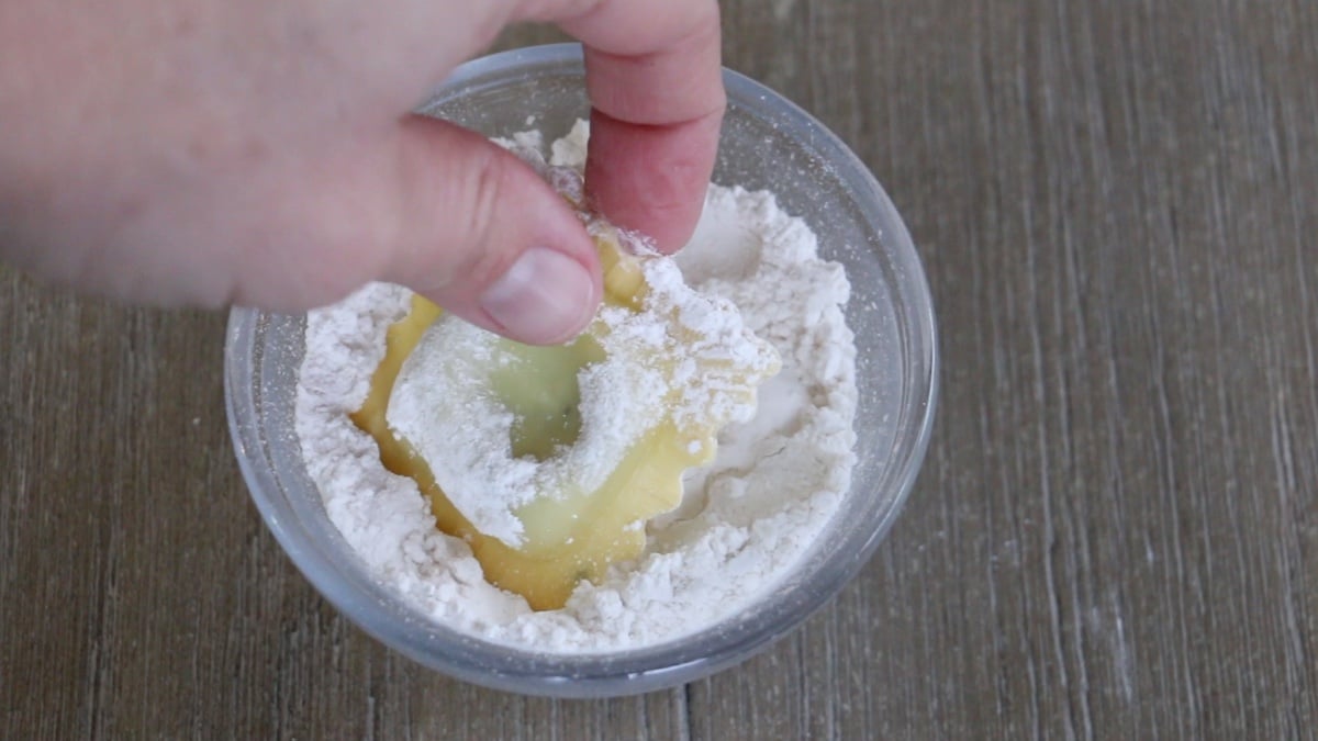 dipping ravioli in flour