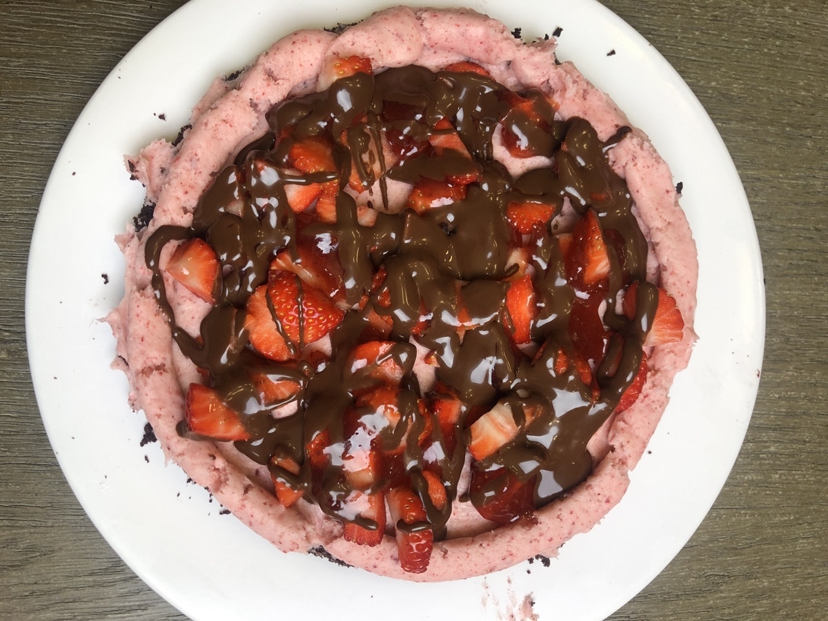 strawberries and chocolate on cake