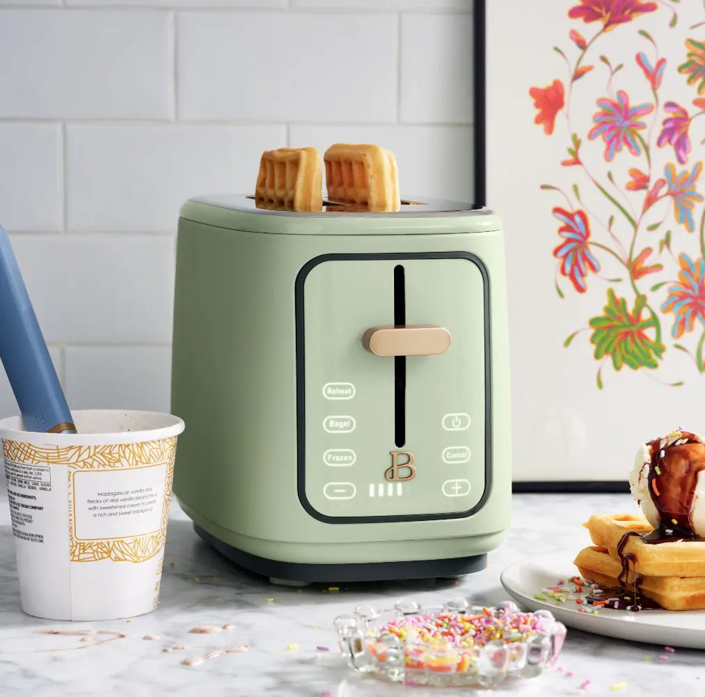 sage green toaster with waffles