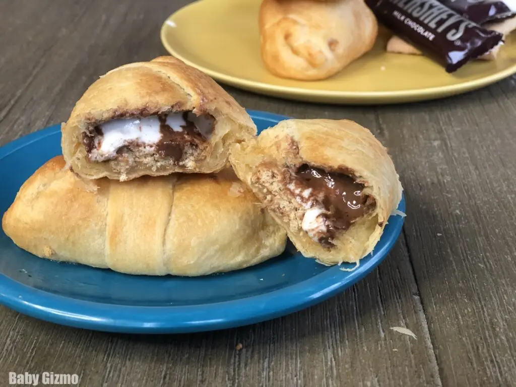 smores crescents cut open on blue plate