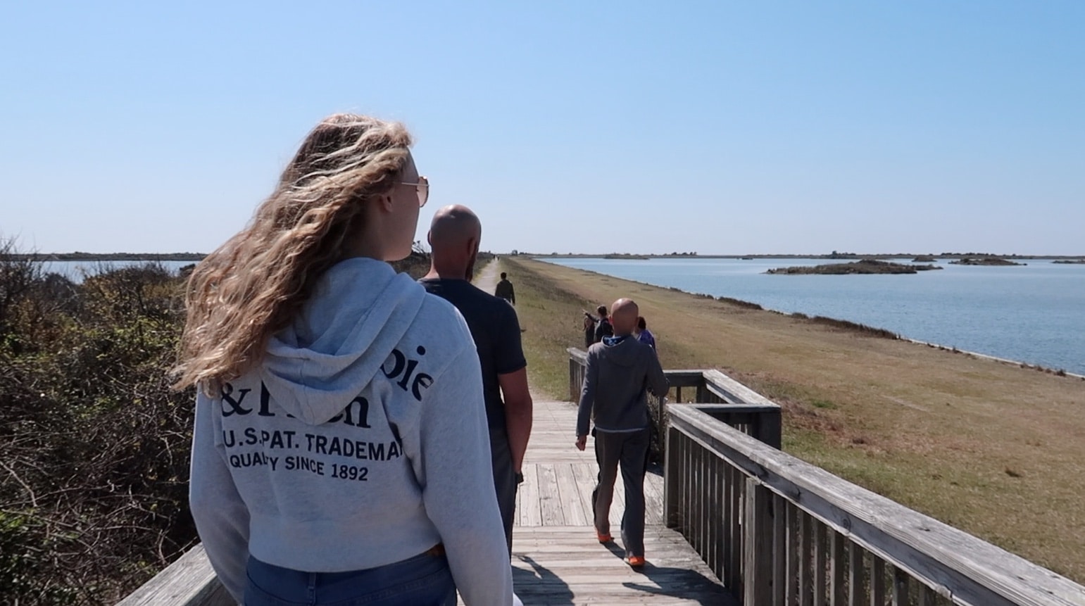 family walking in bird sanctuary