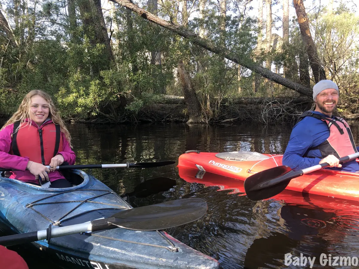 dad and teen daughter kayaking