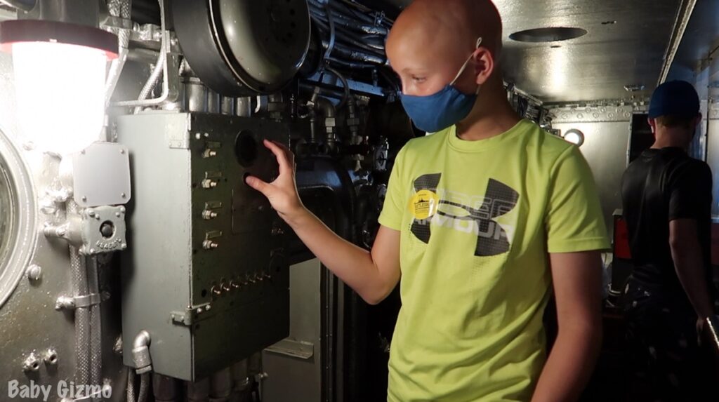 boy exploring wilmington battleship