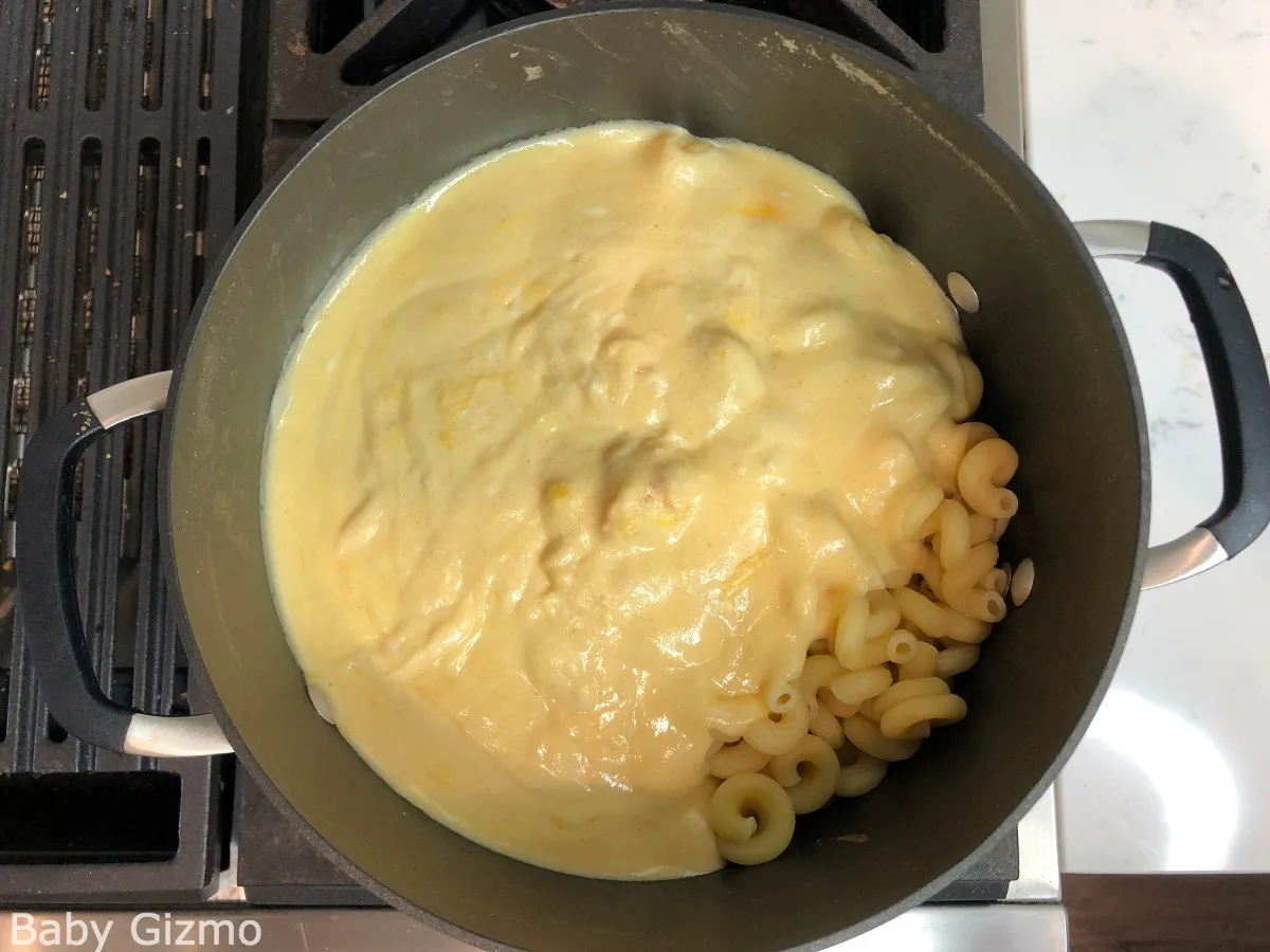 cheese sauce over spiral noodles
