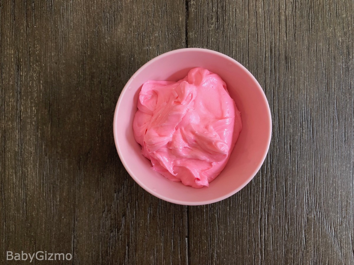 pink frosting in a pink bowl
