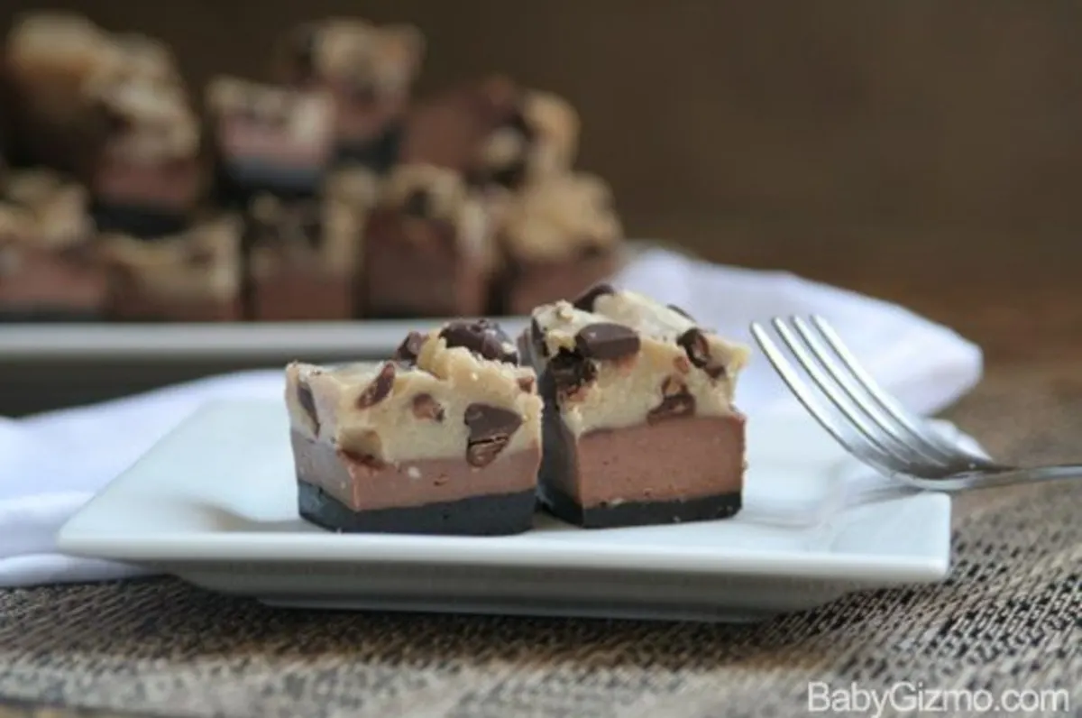 2 chocolate cheesecake cookie bits on a white plate 