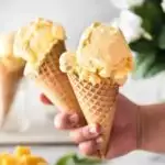 mango ice cream in a cone