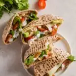 two pita sandwiches cut in half