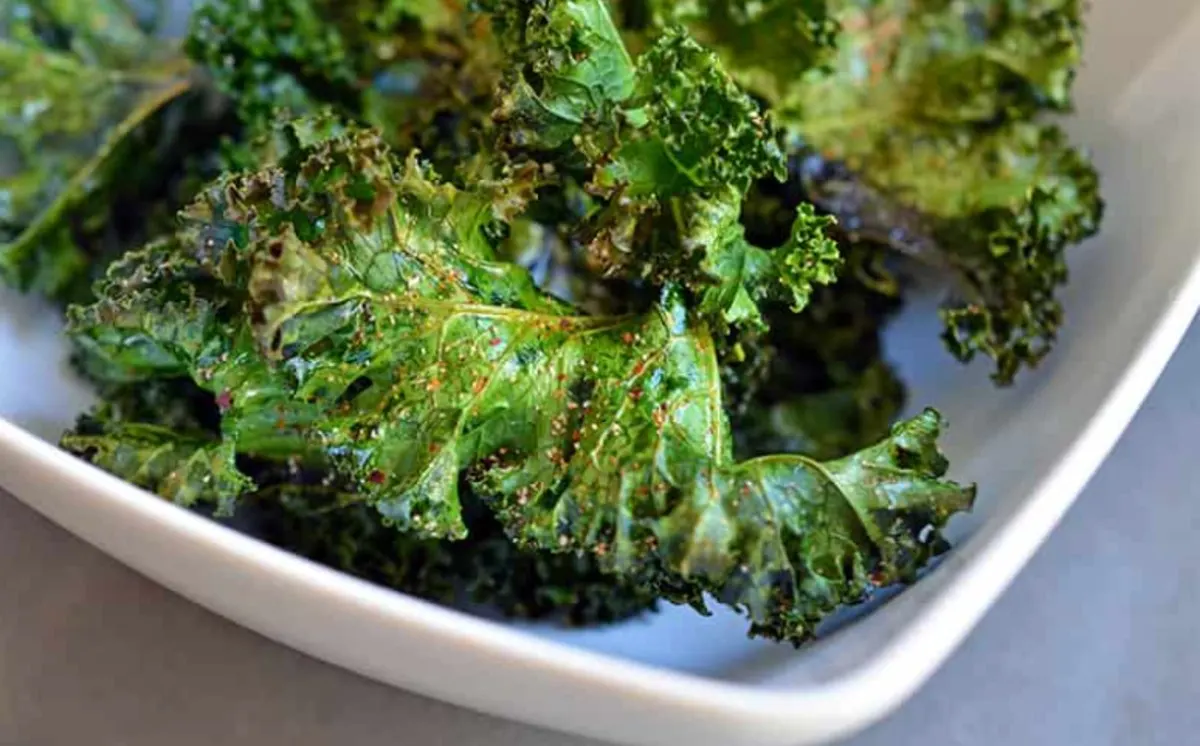 kale chips in white bowl