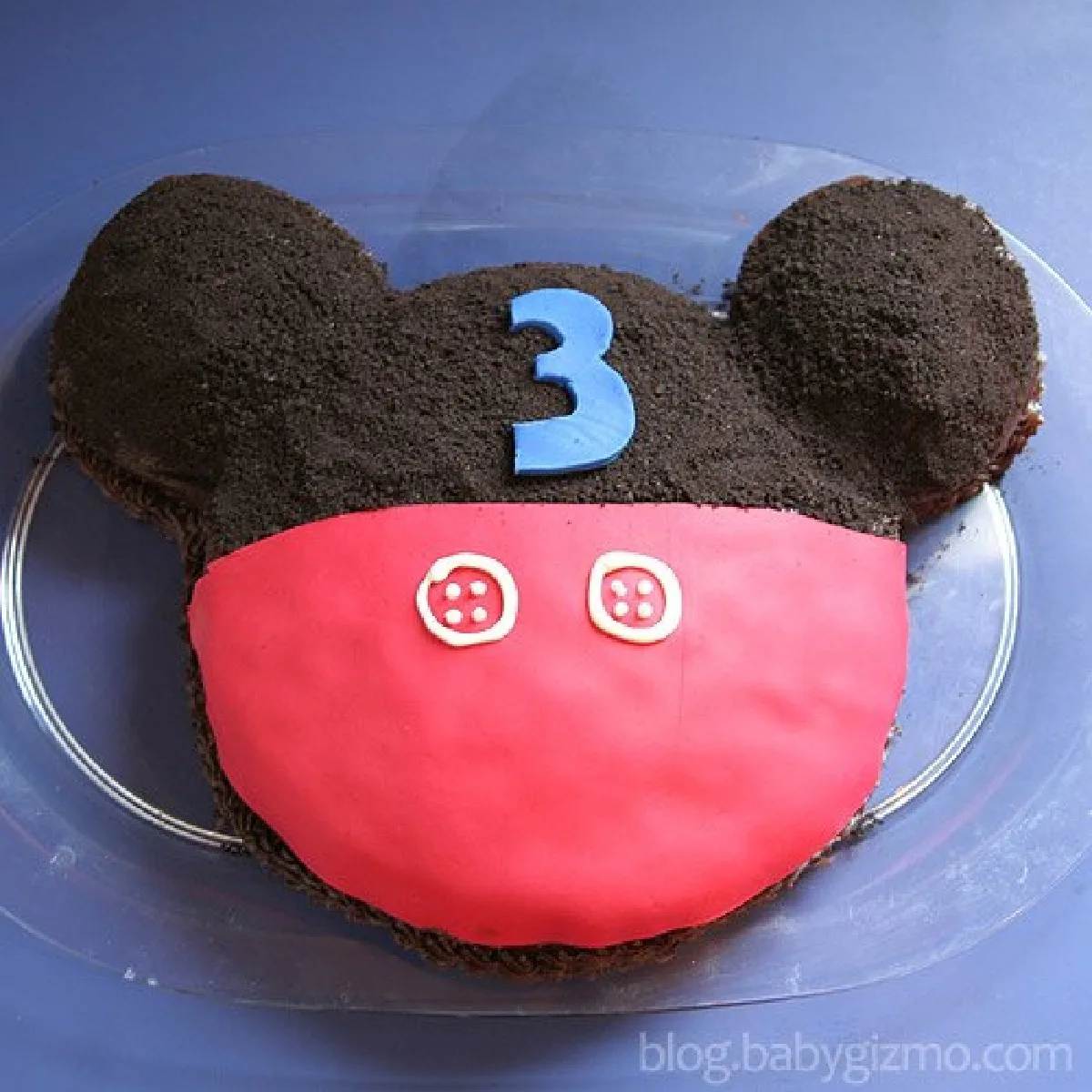 Mickey mouse cake with a 3 on it 