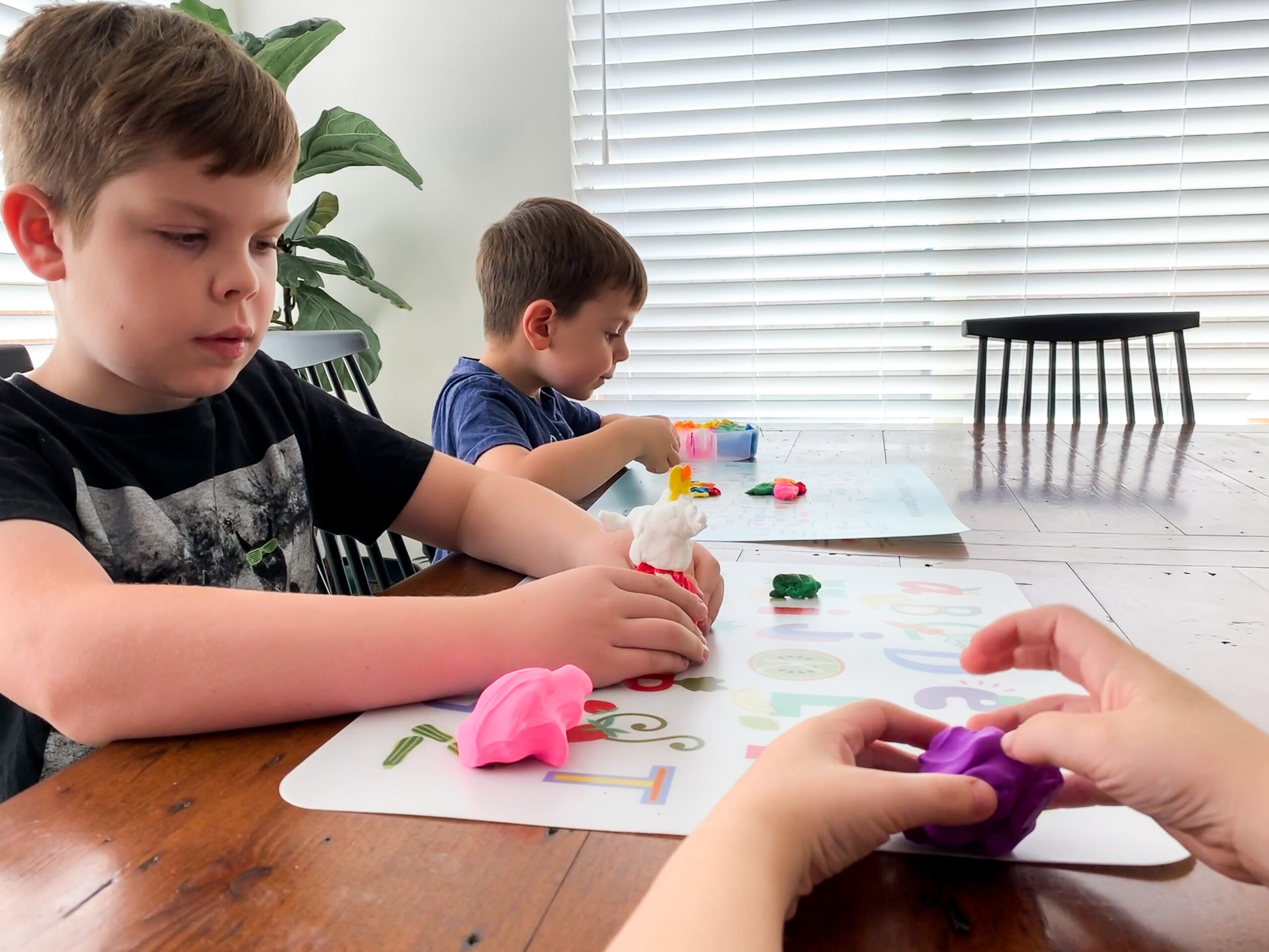 two boys painting