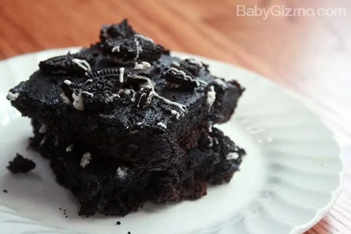 oreotrufflebrownies1 Oreo Truffle Brownies on a white plate stacked