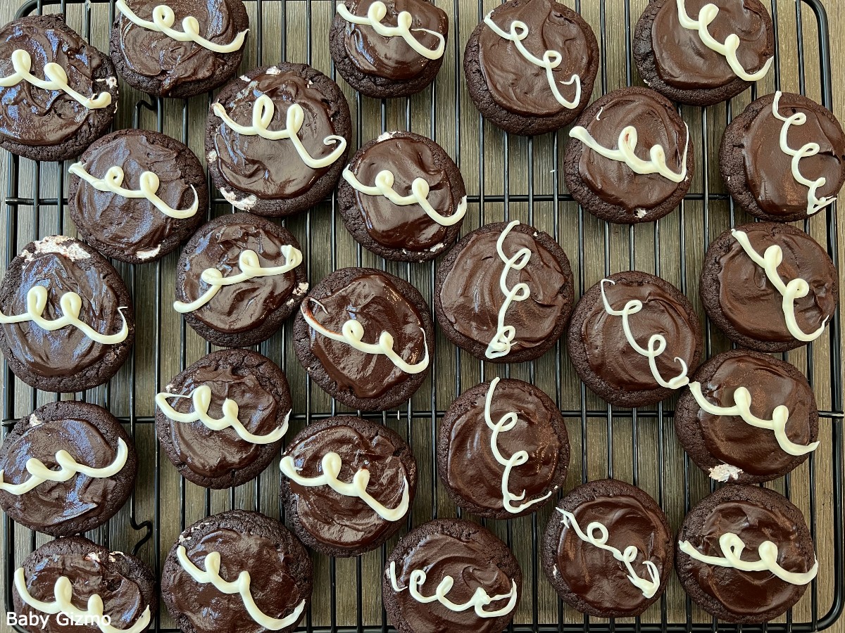 chocolate marshmallow cookies with ganache on cooling rack
