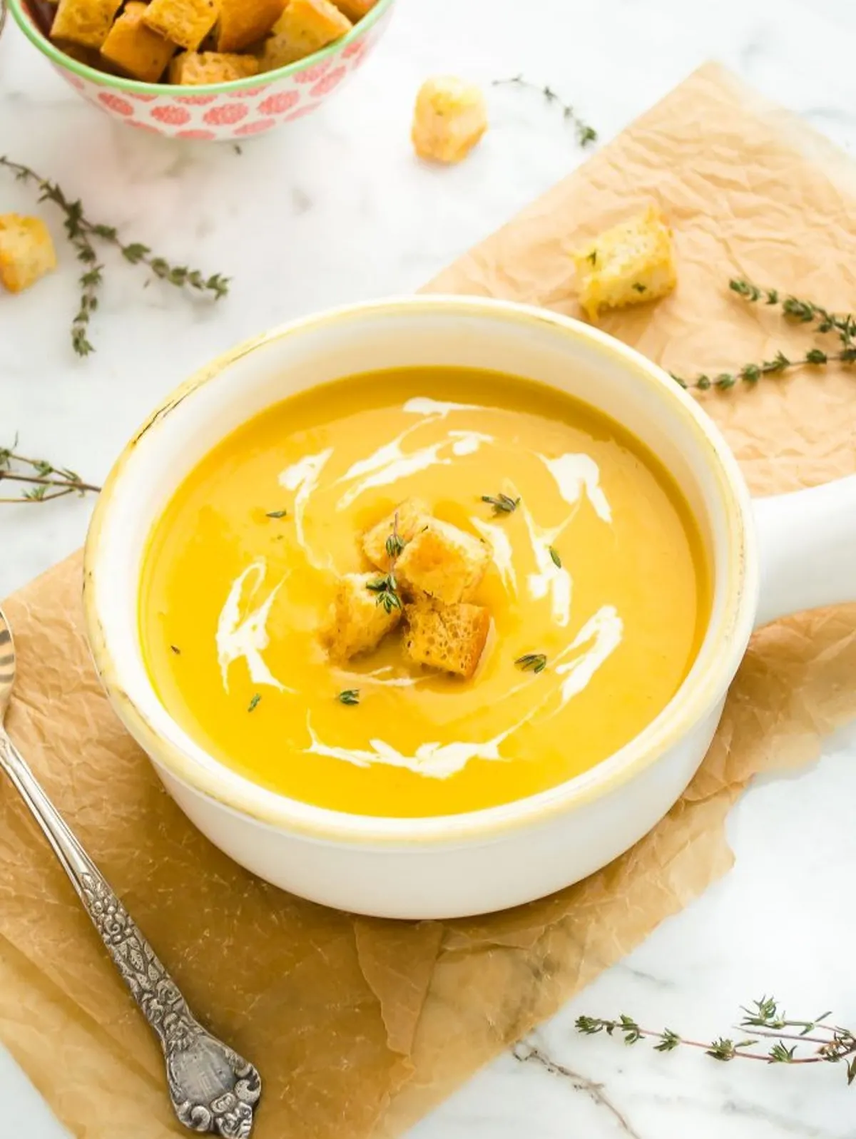 butternut squash potato leek soup in a bowl