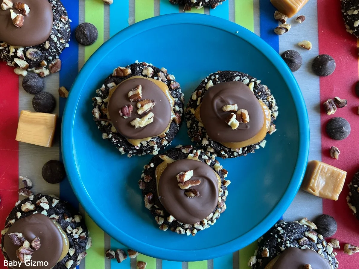 Crumbl Turtle Cookies on Blue Plate