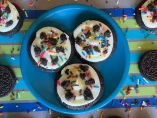 Crumbl Birthday Cake Oreo Cookies on Mat