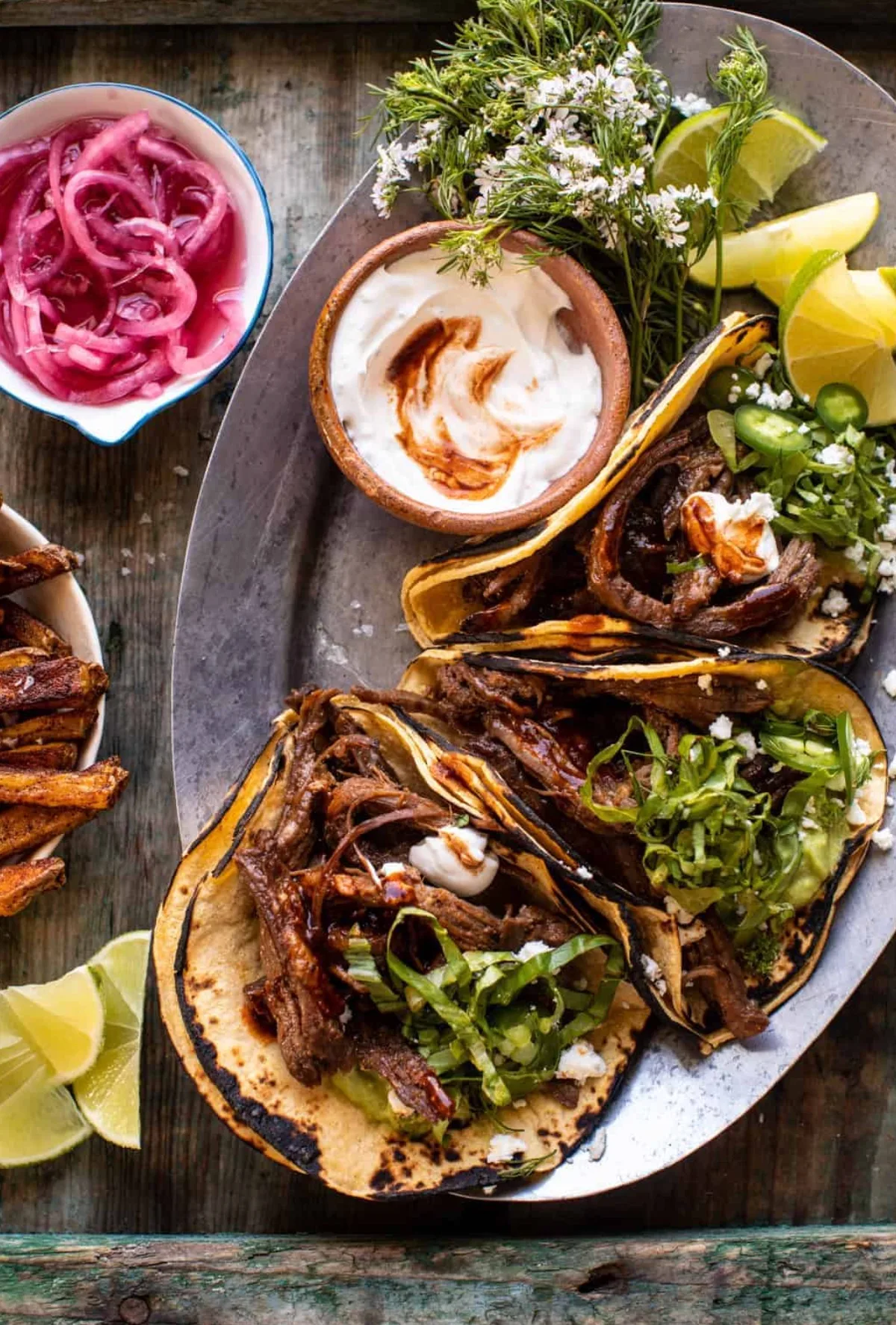 Crockpot Carne Asada Tacos with Cilantro Lime Garlic Sauce